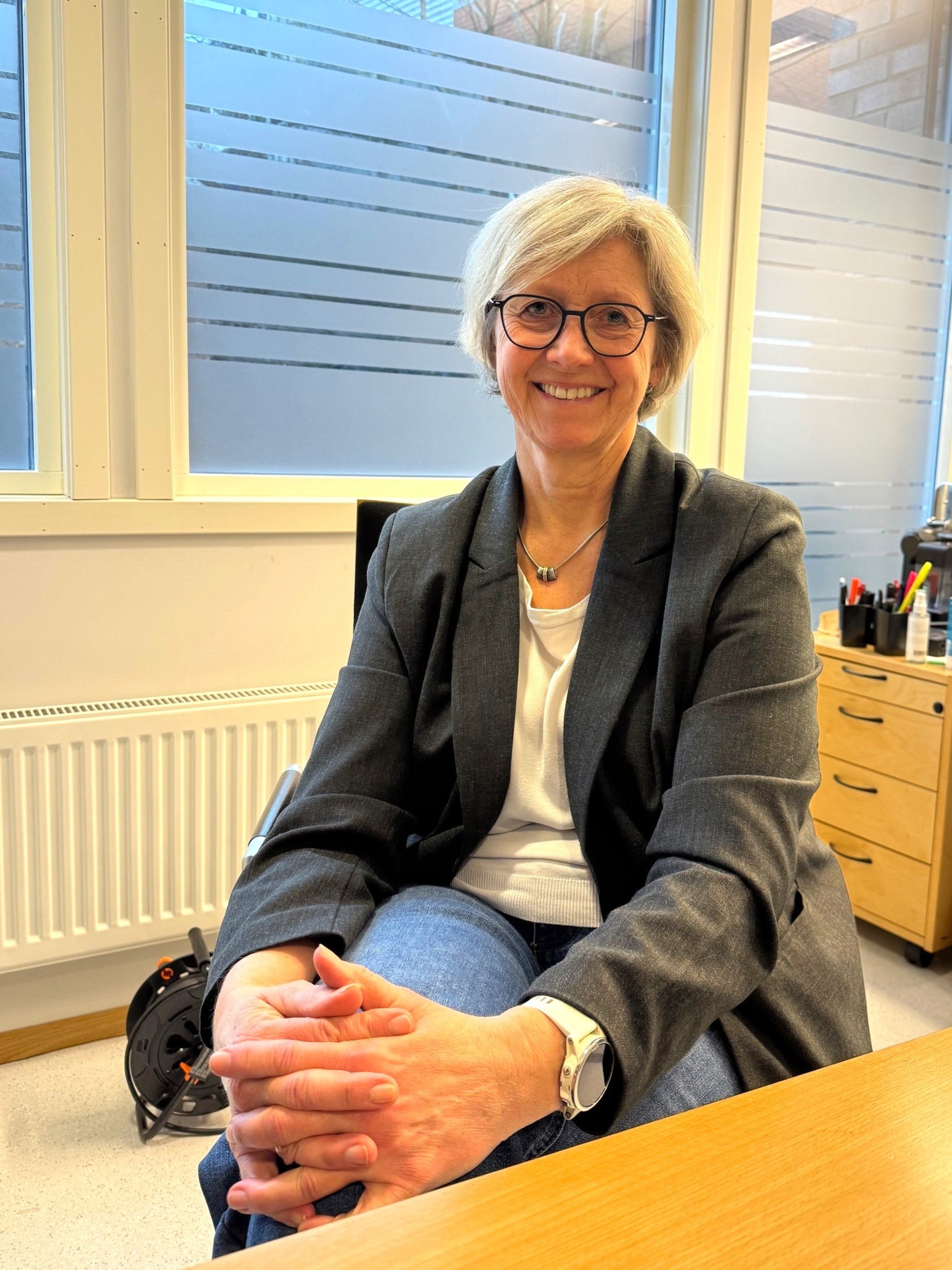 Kristin Sørbrøden Breda på kontoret