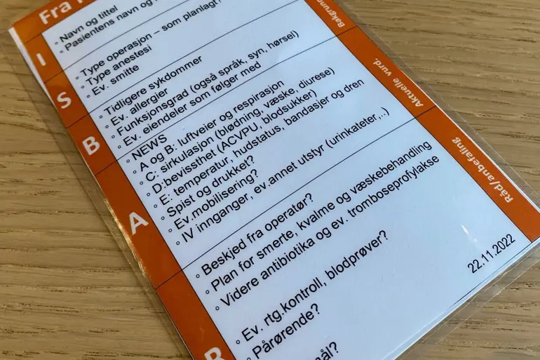 Laminert lommekort med spørsmål