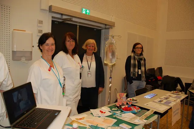 En gruppe kvinner i laboratoriefrakker