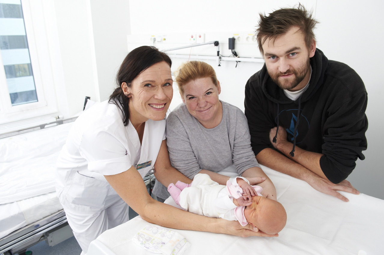 Mor, far, barn og jordmor