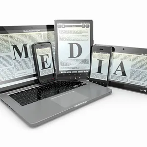 A few laptops with a few open screens