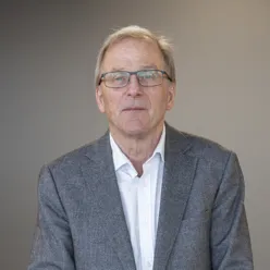 A man wearing glasses