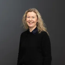 A person smiling for the camera